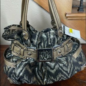 NWT Wilson’s Leather purse.